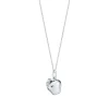 Tiffany & Co. Apple charm in sterling silver on a chain. | ^ Sterling Silver Jewelry