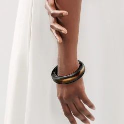 Tiffany & Co. Elsa Peretti® bangle in black and gold lacquer over Japanese hardwood, medium. | ^ Bracelets|Elsa Peretti®