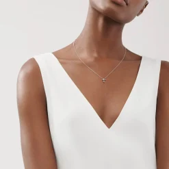 Tiffany & Co. Elsa Peretti® cross pendant in sterling silver, 12 mm long. | ^ Necklaces & Pendants|Sterling Silver Jewelry