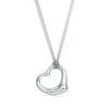 Tiffany & Co. Elsa Peretti® Open Heart pendant in sterling silver on a 30" mesh chain. | ^ Necklaces & Pendants|Bold Silver Jewelry