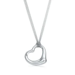 Tiffany & Co. Elsa Peretti® Open Heart pendant in sterling silver on a 30" mesh chain. | ^ Necklaces & Pendants|Bold Silver Jewelry