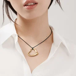 Tiffany & Co. Elsa Peretti® Open Heart pendant in 18k gold. | ^ Necklaces & Pendants|Gold Jewelry