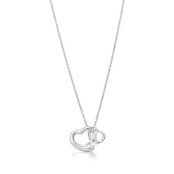 Tiffany & Co. Elsa Peretti® Open Heart pendant of sterling silver and rock crystal. | ^ Necklaces & Pendants|Gifts for Her