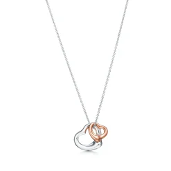 Tiffany & Co. Elsa Peretti® Open Heart pendant in sterling silver and 18k rose gold. | ^ Necklaces & Pendants|Gifts for Her