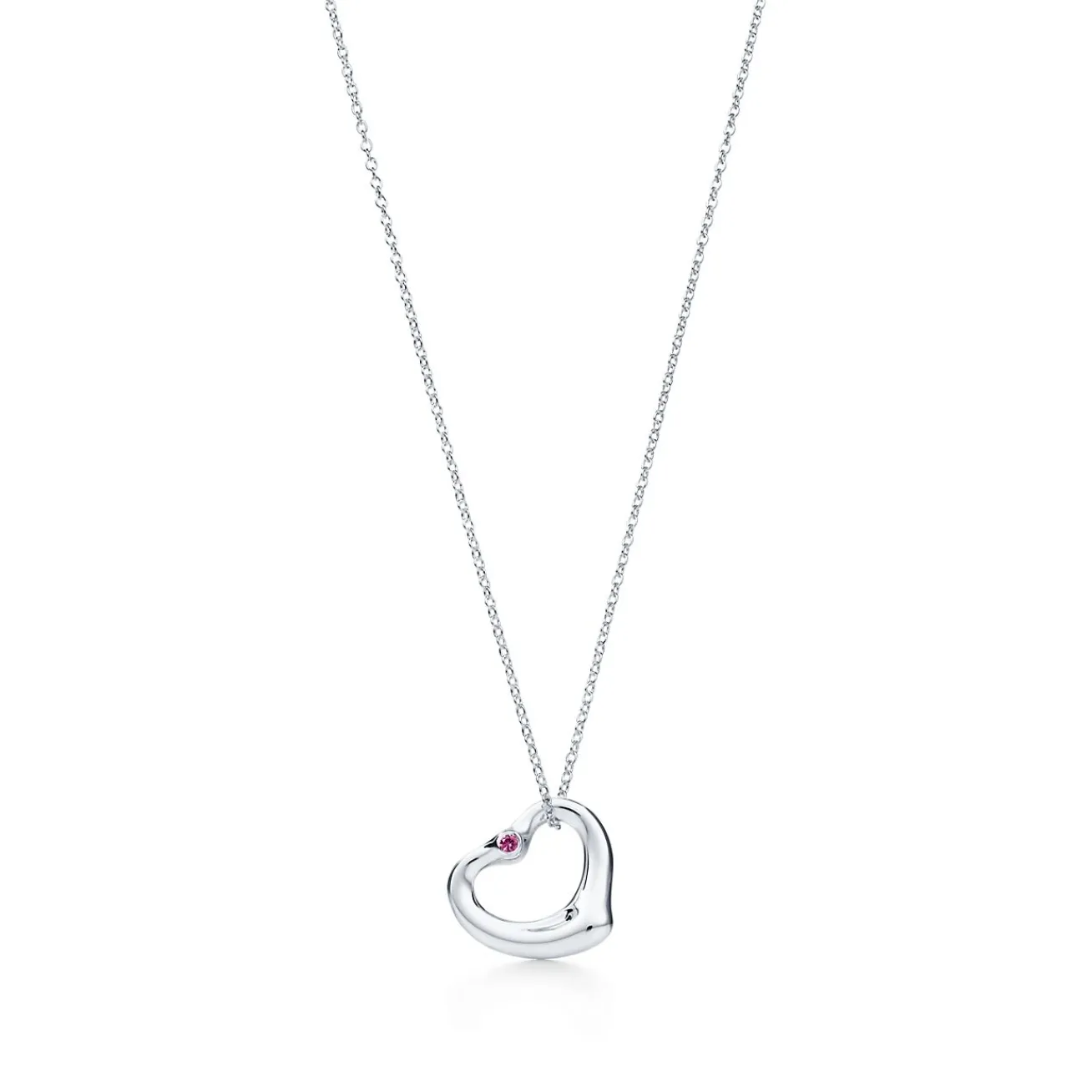 Tiffany & Co. Elsa Peretti® Open Heart pendant in sterling silver with a pink sapphire. | ^ Necklaces & Pendants|Sterling Silver Jewelry