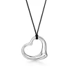 Tiffany & Co. Elsa Peretti® Open Heart pendant in sterling silver on a 16" black silk cord. | ^ Necklaces & Pendants|Sterling Silver Jewelry