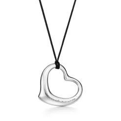 Tiffany & Co. Elsa Peretti® Open Heart pendant in sterling silver on a 16" black silk cord. | ^ Necklaces & Pendants|Sterling Silver Jewelry