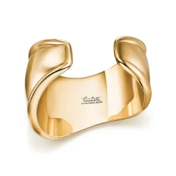 Tiffany & Co. Elsa Peretti® small Bone cuff in 18k gold with green jade, 43 mm wide. | ^ Bracelets|Gold Jewelry