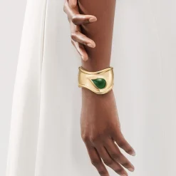 Tiffany & Co. Elsa Peretti® small Bone cuff in 18k gold with green jade, 43 mm wide. | ^ Bracelets|Gold Jewelry