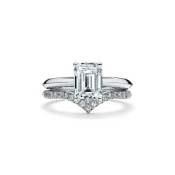 Tiffany & Co. Emerald-cut diamond engagement ring in platinum. | ^ Engagement Rings