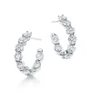 Tiffany & Co. Inside-out hoop earrings in platinum with diamonds. | ^ Earrings|Hoop Earrings