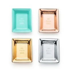 Tiffany & Co. Metallic vide poches in porcelain, set of four. | ^ The Home|Housewarming Gifts
