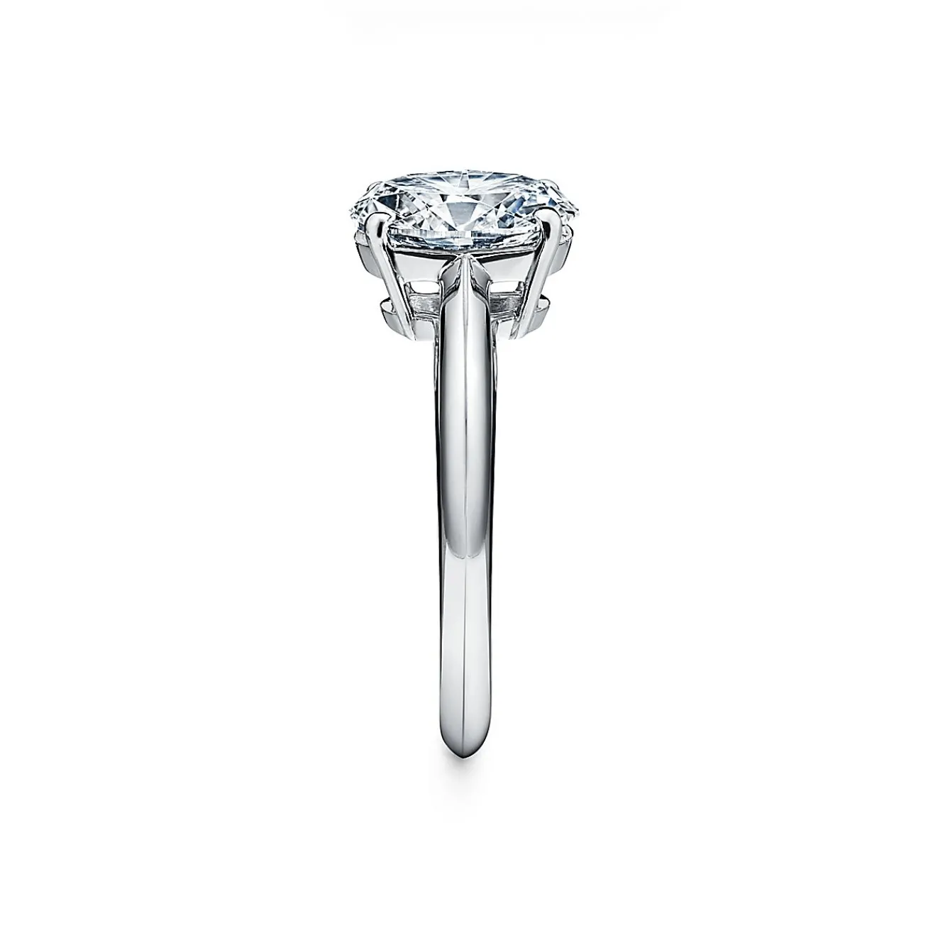 Tiffany & Co. Oval-cut diamond engagement ring in platinum. | ^ Engagement Rings