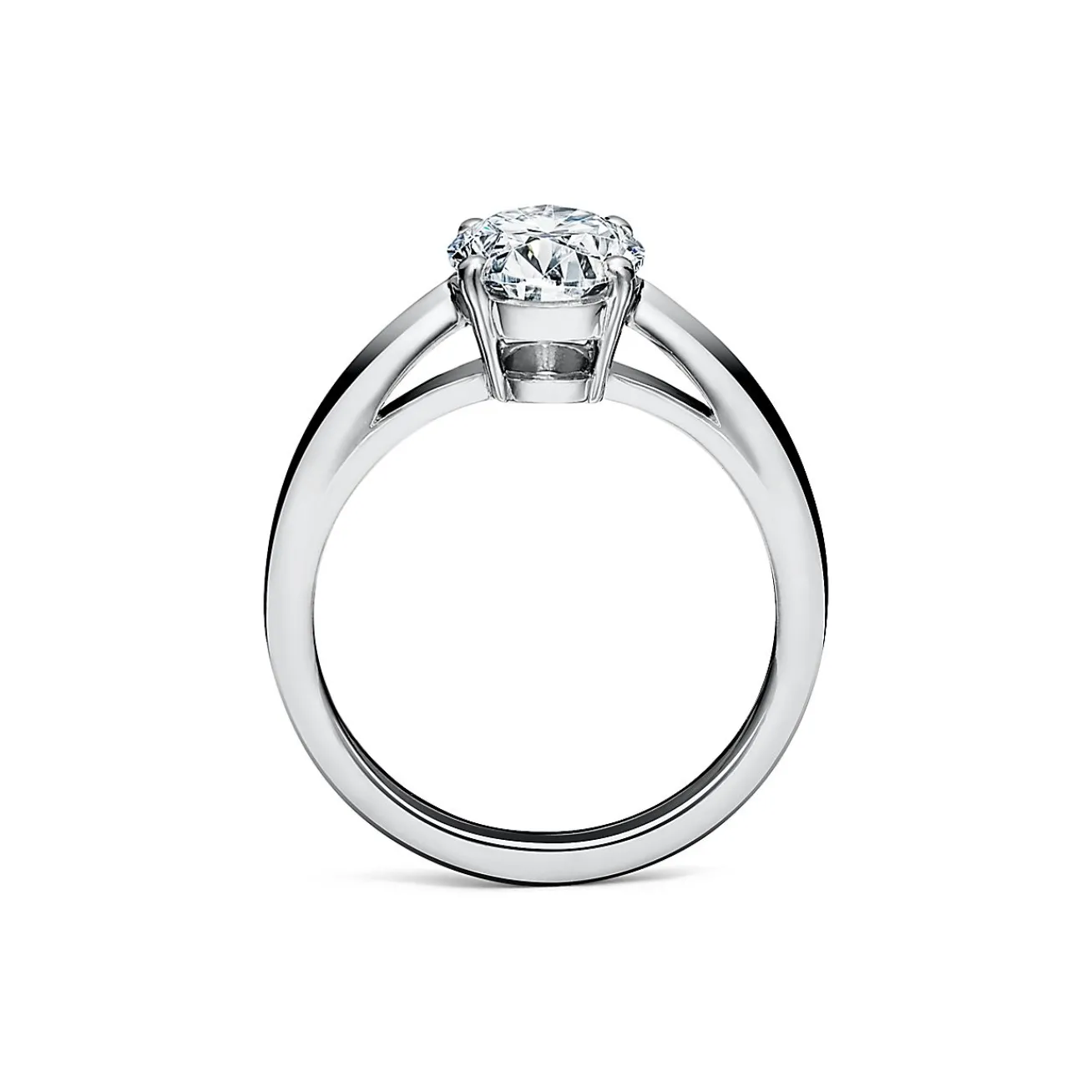 Tiffany & Co. Oval-cut diamond engagement ring in platinum. | ^ Engagement Rings