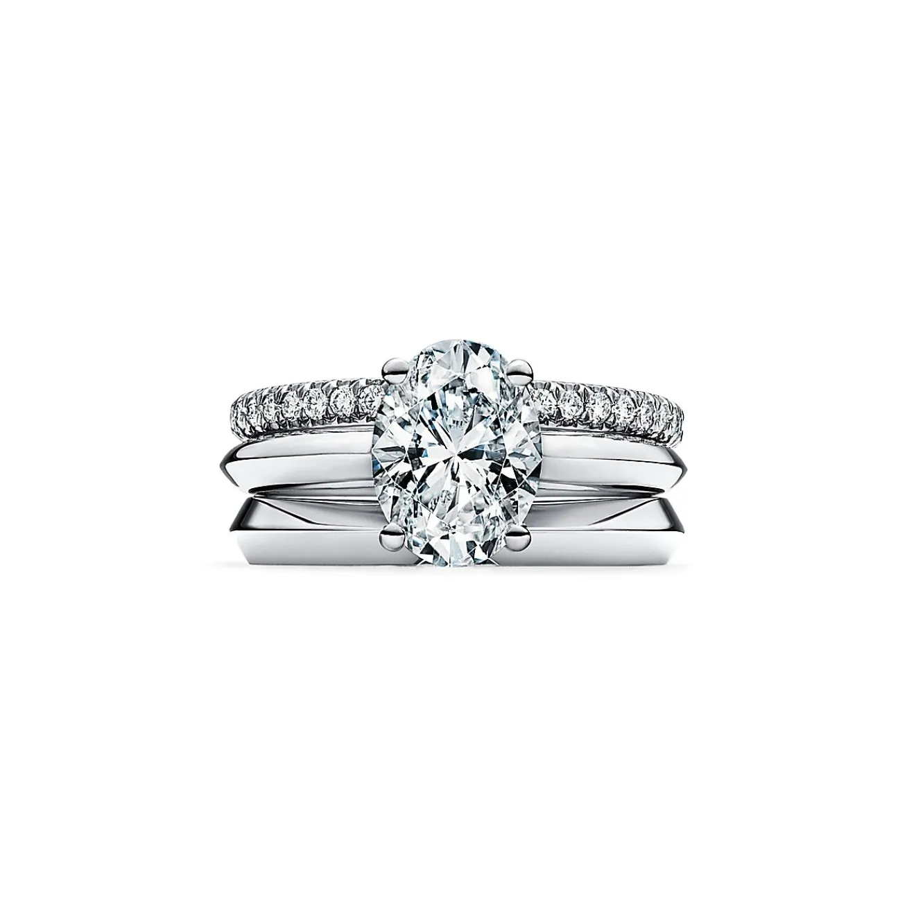 Tiffany & Co. Oval-cut diamond engagement ring in platinum. | ^ Engagement Rings