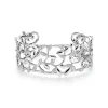 Tiffany & Co. Paloma Picasso® Olive Leaf narrow cuff in 18k white gold with diamonds, medium. | ^ Bracelets
