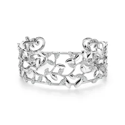 Tiffany & Co. Paloma Picasso® Olive Leaf narrow cuff in 18k white gold with diamonds, medium. | ^ Bracelets