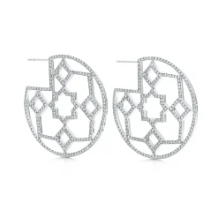 Tiffany & Co. Paloma's Zellige medallion hoop earrings with diamonds in 18k white gold. | ^ Diamond Jewelry