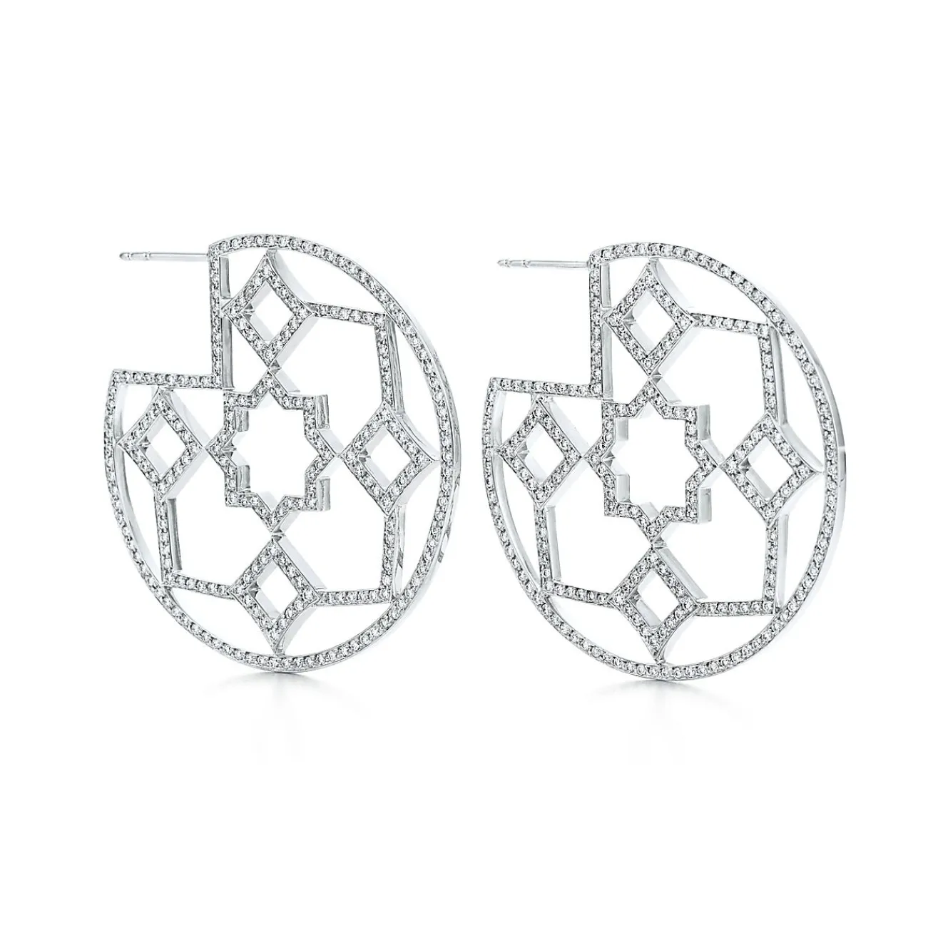 Tiffany & Co. Paloma's Zellige medallion hoop earrings with diamonds in 18k white gold. | ^ Diamond Jewelry