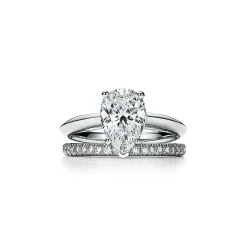 Tiffany & Co. Pear-shaped diamond engagement ring in platinum. | ^ Engagement Rings