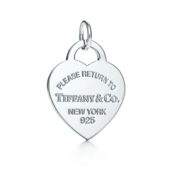 Tiffany & Co. Return to Tiffany™ heart tag charm in sterling silver on a bracelet. | ^ Bracelets|Sterling Silver Jewelry