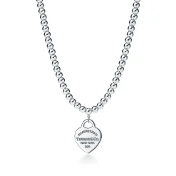 Tiffany & Co. Return to Tiffany® small heart tag in sterling silver on a bead necklace. | ^ Necklaces & Pendants|Gifts for Her