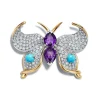 Tiffany & Co. Schlumberger Butterfly clip in 18k gold with colored gemstones and diamonds. | ^ Diamond Jewelry