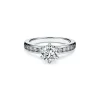 Tiffany & Co. The Tiffany® Setting with a diamond band: world's most iconic engagement ring. | ^ Engagement Rings