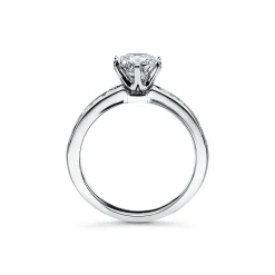 Tiffany & Co. The Tiffany® Setting with a diamond band: world's most iconic engagement ring. | ^ Engagement Rings