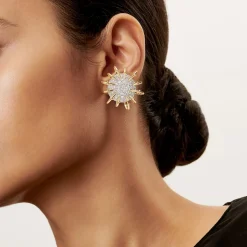 Tiffany & Co. Schlumberger® Apollo ear clips in gold with diamonds in platinum. | ^ Earrings|Gold Jewelry