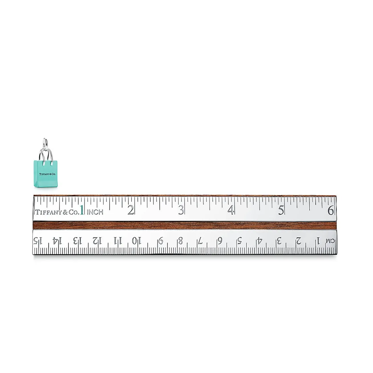 Tiffany & Co. ® shopping bag charm in sterling silver with enamel finish. | ^ Sterling Silver Jewelry|Tiffany Blue® Gifts
