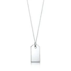 Tiffany & Co. Tiffany Charms tag in sterling silver, medium. | ^ Sterling Silver Jewelry