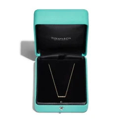 Tiffany & Co. Tiffany Fleur de Lis key bar pendant in 18k gold with diamonds. | ^ Necklaces & Pendants|Gold Jewelry