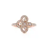 Tiffany & Co. Tiffany Fleur de Lis ring in 18k rose gold with diamonds. | ^ Rings|Rose Gold Jewelry