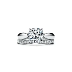 Tiffany & Co. Tiffany Harmony® engagement ring in platinum: a study in balance and grace. | ^ Engagement Rings