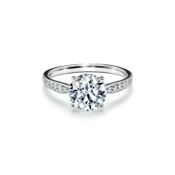 Tiffany & Co. Tiffany Harmony® engagement ring with a diamond band in platinum. | ^ Engagement Rings