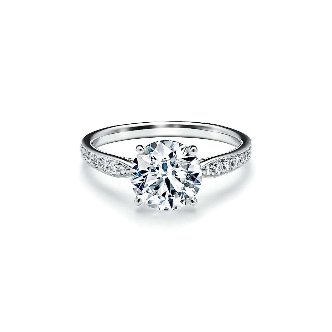 Tiffany & Co. Tiffany Harmony® engagement ring with a diamond band in platinum. | ^ Engagement Rings