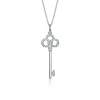 Tiffany & Co. Tiffany Keys crown key pendant with diamonds in 18k white gold on a chain. | ^ Diamond Jewelry