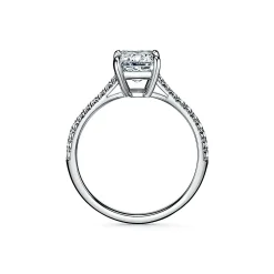 Tiffany & Co. Tiffany Novo® emerald-cut engagement ring with a pavé diamond band in platinum. | ^ Engagement Rings