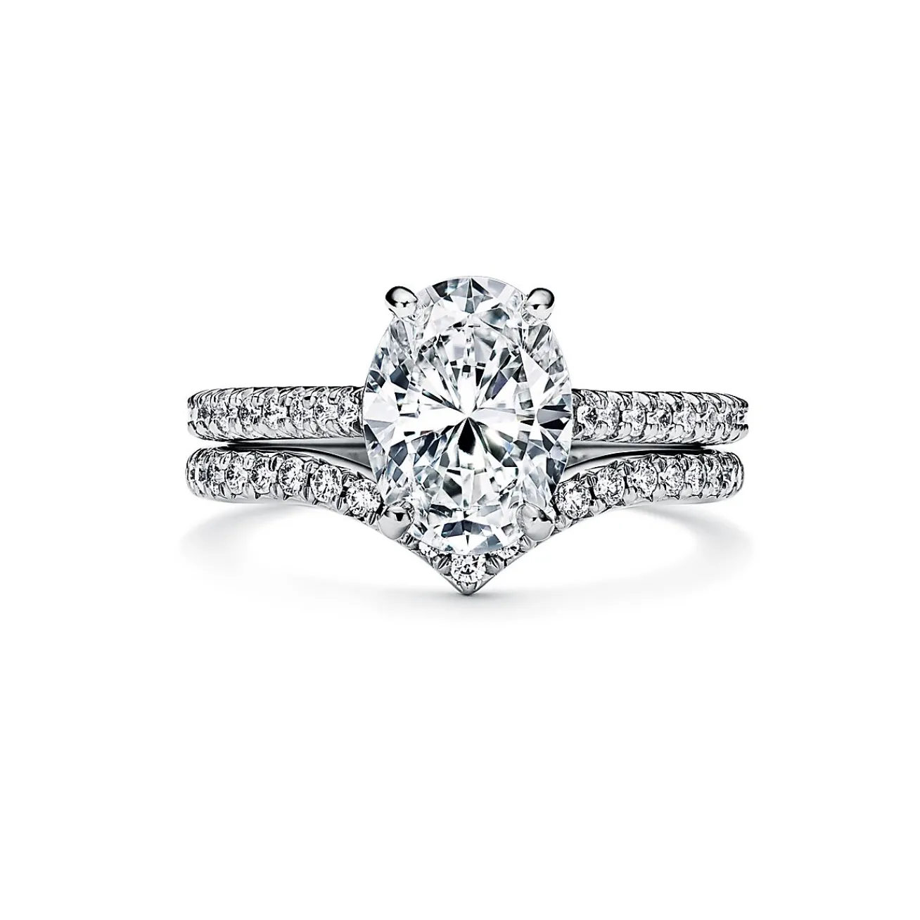 Tiffany & Co. Tiffany Novo® oval brilliant engagement ring with a pavé diamond platinum band. | ^ Engagement Rings