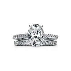 Tiffany & Co. Tiffany Novo® oval brilliant engagement ring with a pavé diamond platinum band. | ^ Engagement Rings