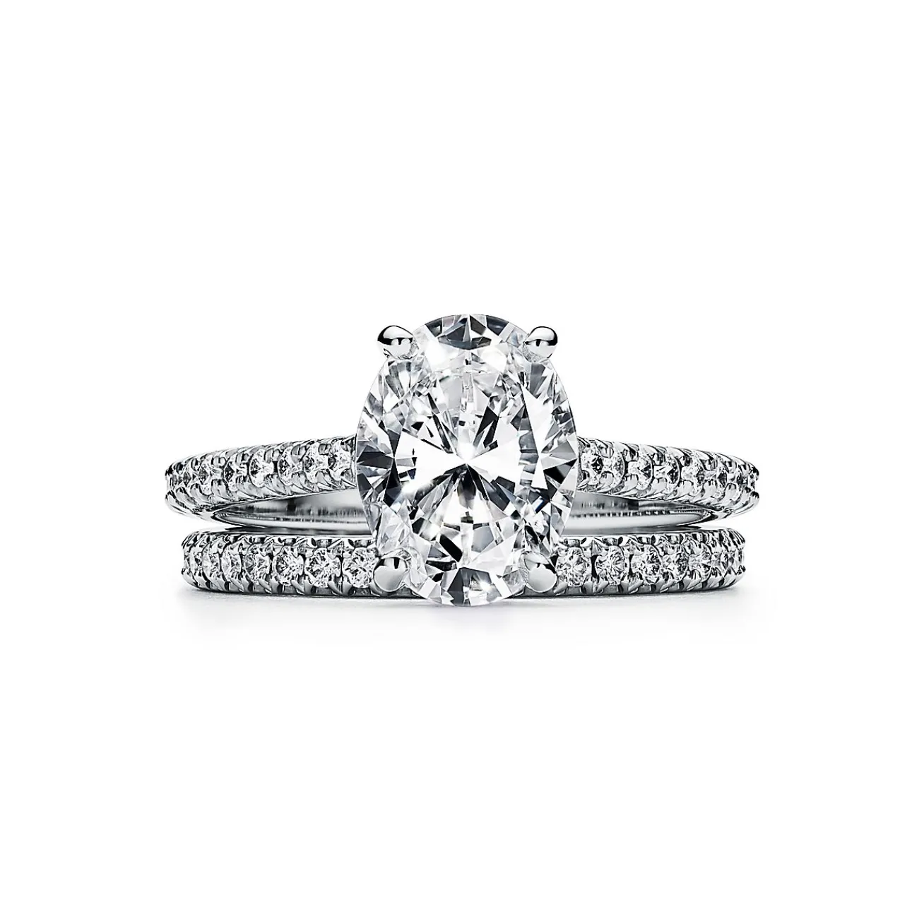 Tiffany & Co. Tiffany Novo® oval brilliant engagement ring with a pavé diamond platinum band. | ^ Engagement Rings