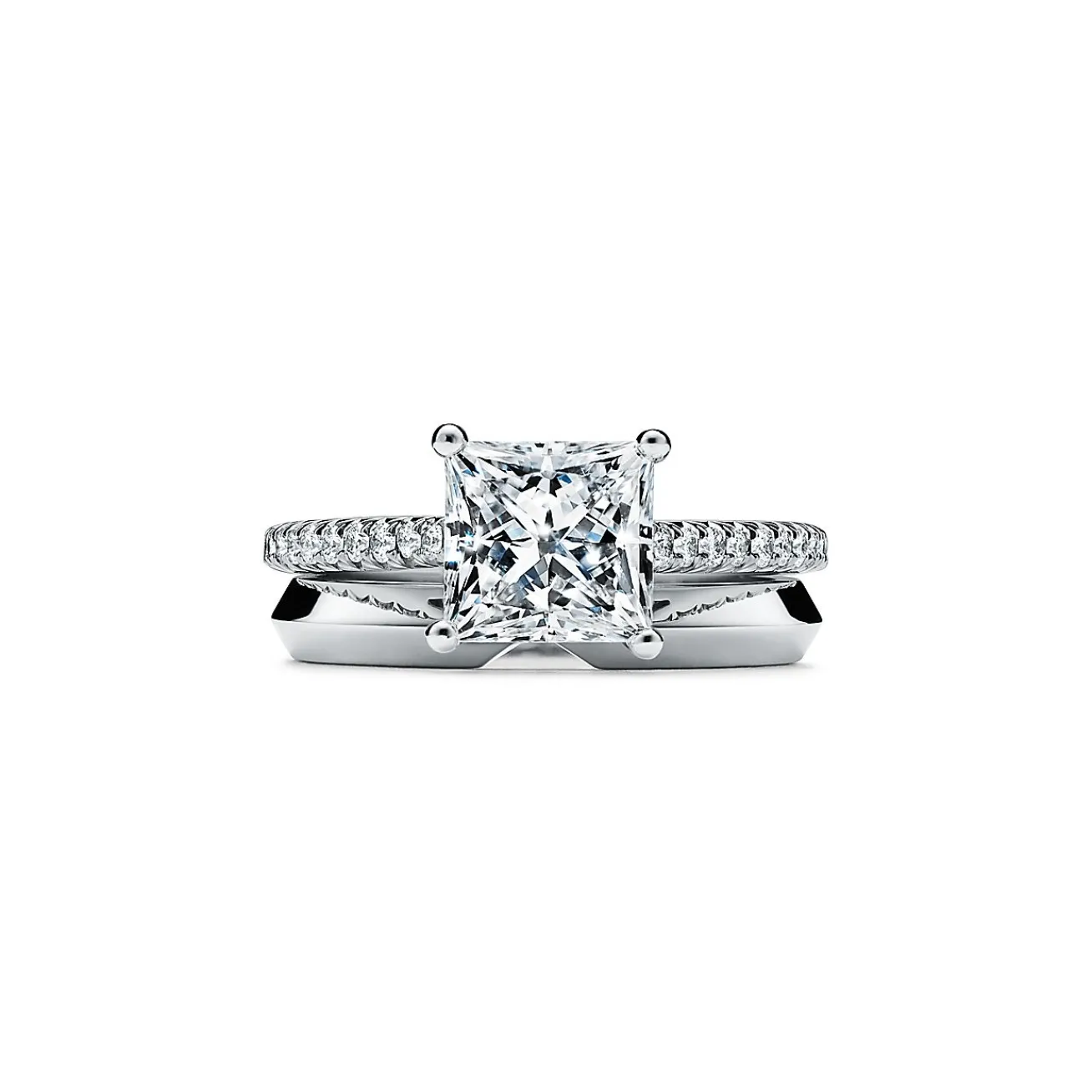 Tiffany & Co. Tiffany Novo® princess-cut engagement ring with a pavé diamond platinum band. | ^ Engagement Rings