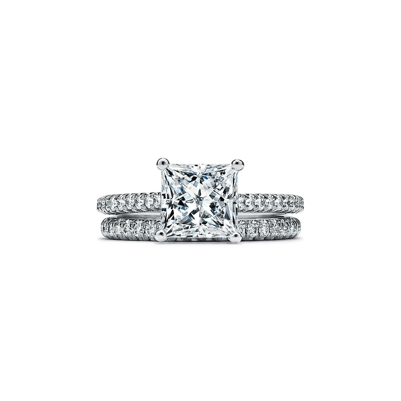 Tiffany & Co. Tiffany Novo® princess-cut engagement ring with a pavé diamond platinum band. | ^ Engagement Rings