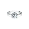 Tiffany & Co. Tiffany Novo® round brilliant engagement ring with a pavé diamond platinum band. | ^ Engagement Rings