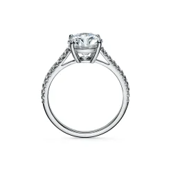 Tiffany & Co. Tiffany Novo® round brilliant engagement ring with a pavé diamond platinum band. | ^ Engagement Rings