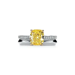 Tiffany & Co. Tiffany Novo® yellow diamond engagement ring with a pavé diamond platinum band. | ^ Engagement Rings
