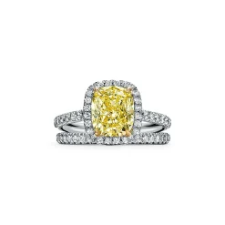 Tiffany & Co. Tiffany Soleste® cushion-cut engagement ring with a diamond band in platinum. | ^ Engagement Rings