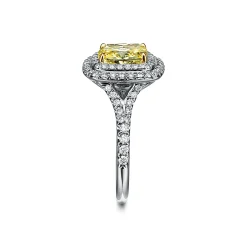 Tiffany & Co. Tiffany Soleste® cushion-cut yellow diamond halo engagement ring in platinum. | ^ Engagement Rings