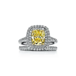 Tiffany & Co. Tiffany Soleste® cushion-cut yellow diamond halo engagement ring in platinum. | ^ Engagement Rings